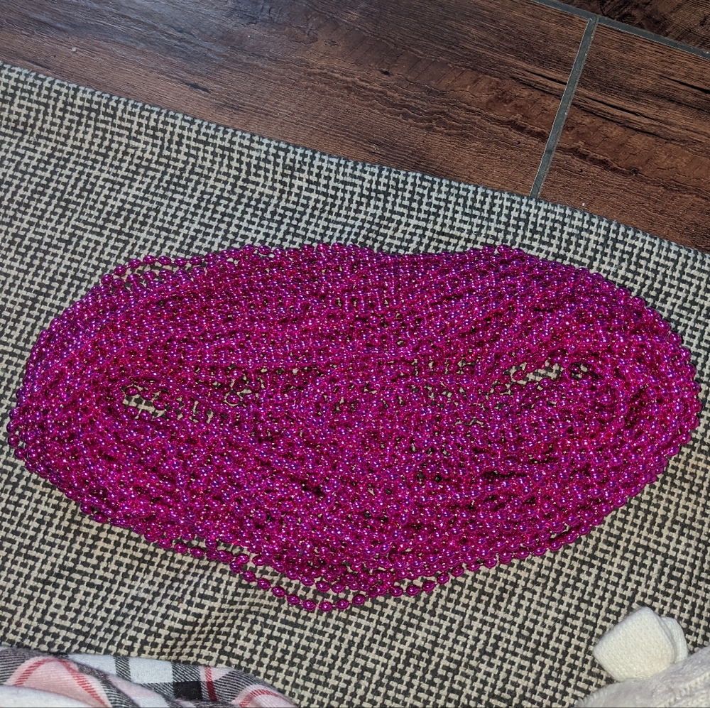 Hot pink Mardi gras beads